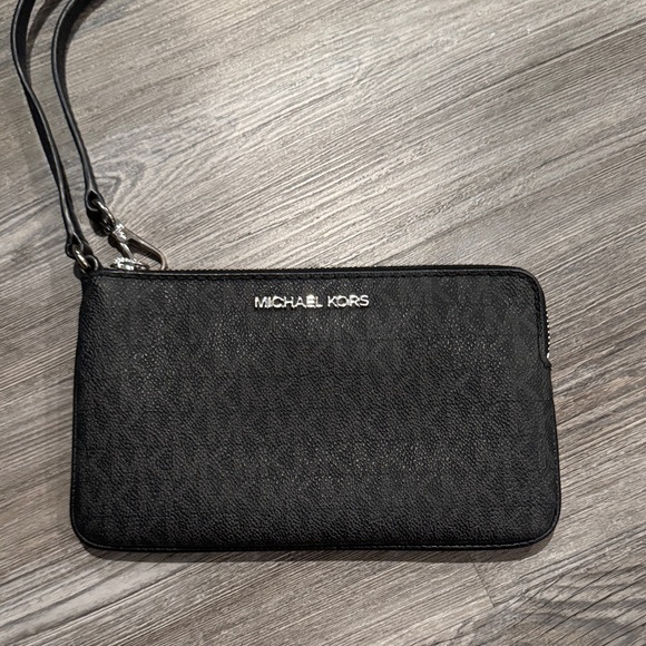 Michael Kors Handbags - Michael Kors Black Wristlet with Silver Accents